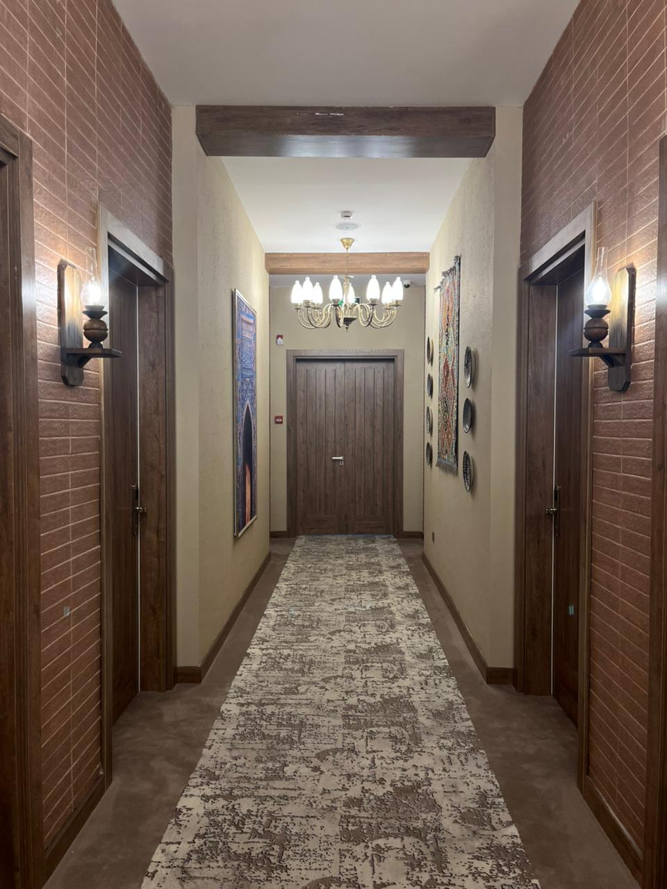 Guest floor corridor with decorative doors